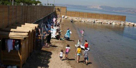 Tesettür plaja tepki sürüyor