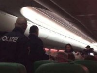 Uçakta gaz çıkarma kavgası